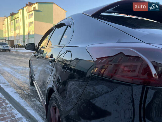 Чорний Міцубісі Lancer, об'ємом двигуна 1.8 л та пробігом 138 тис. км за 6777 $, фото 31 на Automoto.ua