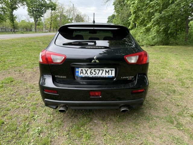 Черный Мицубиси Лансер, объемом двигателя 2 л и пробегом 190 тыс. км за 7100 $, фото 3 на Automoto.ua