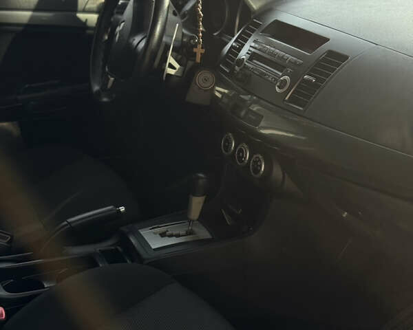 Мицубиси Лансер 2008 в Днепре (Днепропетровске) на Automoto.ua Черный Мицубиси Лансер, объемом двигателя 1.8 л и пробегом 280 тыс. км за 6299 $, фото 7 на Automoto.ua