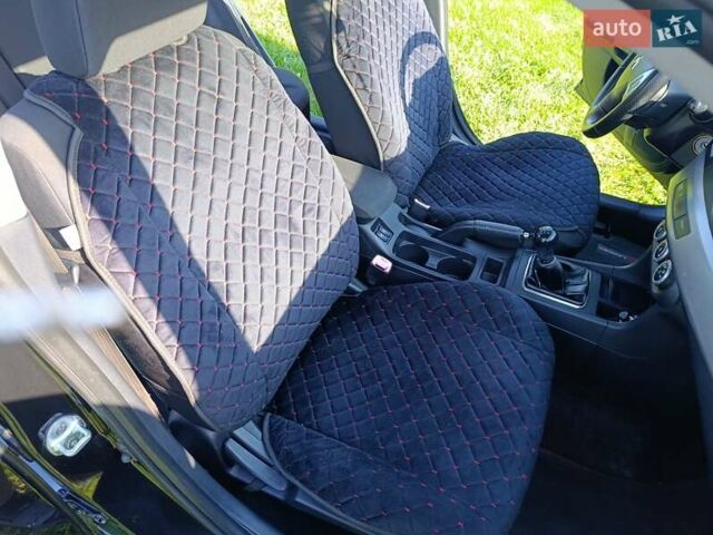 Чорний Міцубісі Lancer, об'ємом двигуна 1.8 л та пробігом 188 тис. км за 6399 $, фото 29 на Automoto.ua