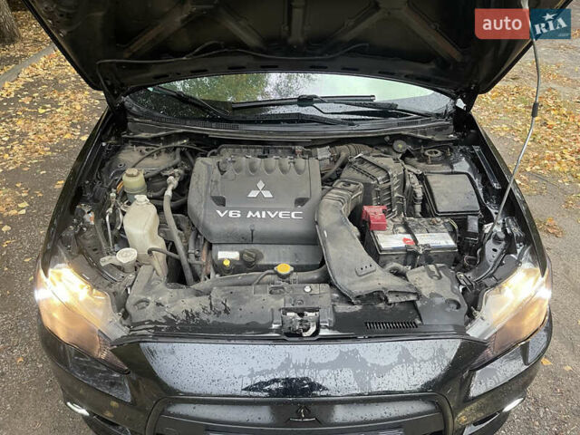 Чорний Міцубісі Lancer, об'ємом двигуна 3 л та пробігом 190 тис. км за 7000 $, фото 9 на Automoto.ua