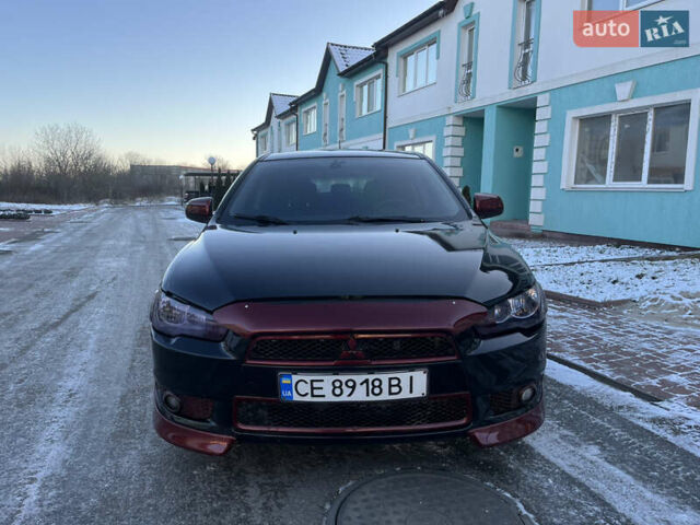 Чорний Міцубісі Lancer, об'ємом двигуна 1.8 л та пробігом 138 тис. км за 6777 $, фото 11 на Automoto.ua