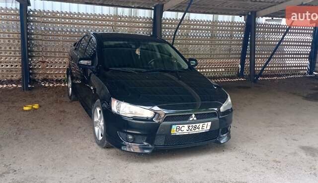 Чорний Міцубісі Lancer, об'ємом двигуна 2 л та пробігом 49 тис. км за 12500 $, фото 7 на Automoto.ua