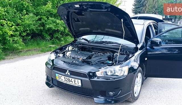 Чорний Міцубісі Lancer, об'ємом двигуна 2 л та пробігом 49 тис. км за 12500 $, фото 9 на Automoto.ua