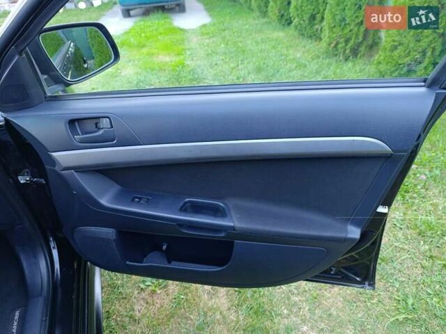 Чорний Міцубісі Lancer, об'ємом двигуна 1.8 л та пробігом 188 тис. км за 6399 $, фото 3 на Automoto.ua