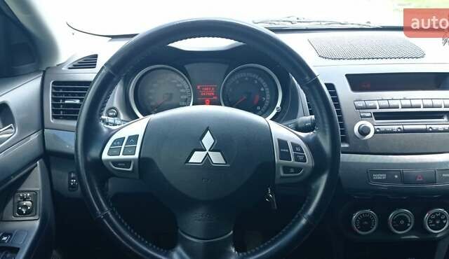 Чорний Міцубісі Lancer, об'ємом двигуна 2 л та пробігом 49 тис. км за 12500 $, фото 38 на Automoto.ua