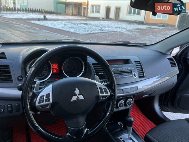 Чорний Міцубісі Lancer, об'ємом двигуна 1.8 л та пробігом 138 тис. км за 6777 $, фото 46 на Automoto.ua