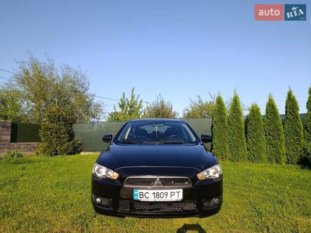 Чорний Міцубісі Lancer, об'ємом двигуна 1.8 л та пробігом 188 тис. км за 6399 $, фото 33 на Automoto.ua