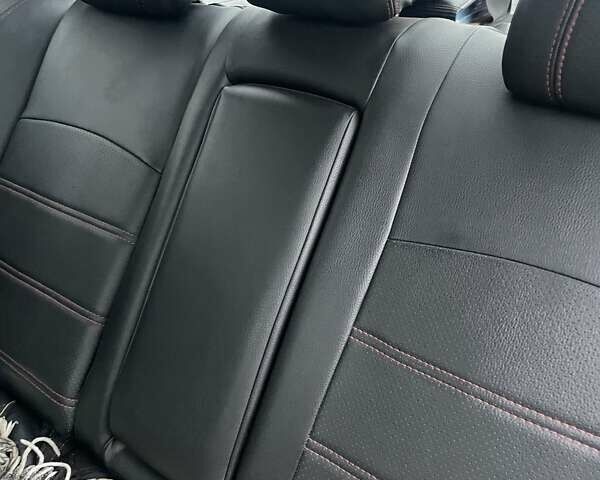 Черный Мицубиси Лансер, объемом двигателя 2 л и пробегом 260 тыс. км за 6000 $, фото 10 на Automoto.ua