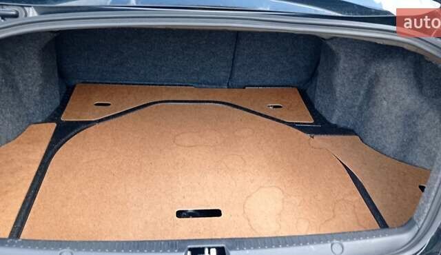 Чорний Міцубісі Lancer, об'ємом двигуна 2 л та пробігом 49 тис. км за 12500 $, фото 34 на Automoto.ua