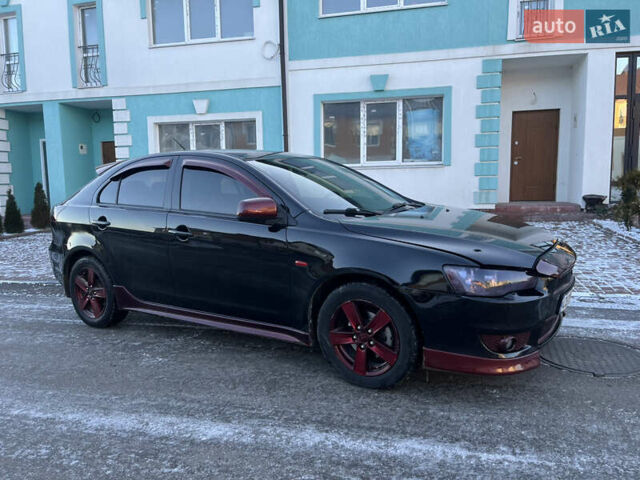 Чорний Міцубісі Lancer, об'ємом двигуна 1.8 л та пробігом 138 тис. км за 6777 $, фото 22 на Automoto.ua