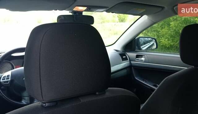 Чорний Міцубісі Lancer, об'ємом двигуна 2 л та пробігом 49 тис. км за 12500 $, фото 37 на Automoto.ua