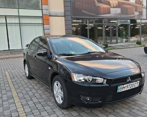 Чорний Міцубісі Lancer, об'ємом двигуна 2 л та пробігом 120 тис. км за 6950 $, фото 1 на Automoto.ua