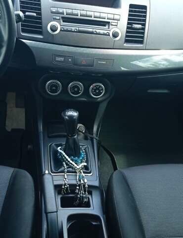 Чорний Міцубісі Lancer, об'ємом двигуна 2 л та пробігом 49 тис. км за 12500 $, фото 33 на Automoto.ua