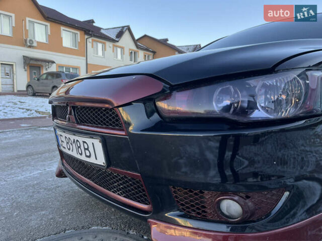 Чорний Міцубісі Lancer, об'ємом двигуна 1.8 л та пробігом 138 тис. км за 6777 $, фото 25 на Automoto.ua