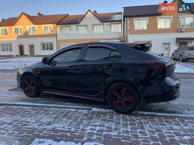 Чорний Міцубісі Lancer, об'ємом двигуна 1.8 л та пробігом 138 тис. км за 6777 $, фото 15 на Automoto.ua