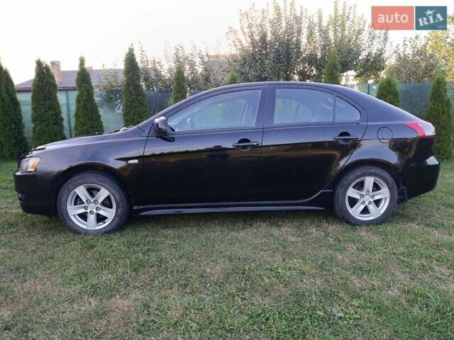 Чорний Міцубісі Lancer, об'ємом двигуна 1.8 л та пробігом 188 тис. км за 6399 $, фото 15 на Automoto.ua