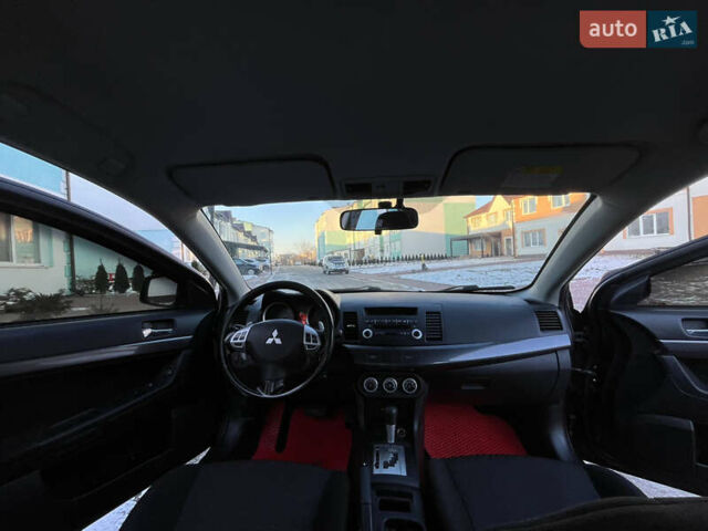 Чорний Міцубісі Lancer, об'ємом двигуна 1.8 л та пробігом 138 тис. км за 6777 $, фото 51 на Automoto.ua