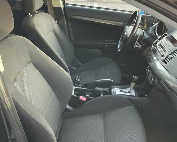Чорний Міцубісі Lancer, об'ємом двигуна 1.8 л та пробігом 280 тис. км за 5900 $, фото 14 на Automoto.ua