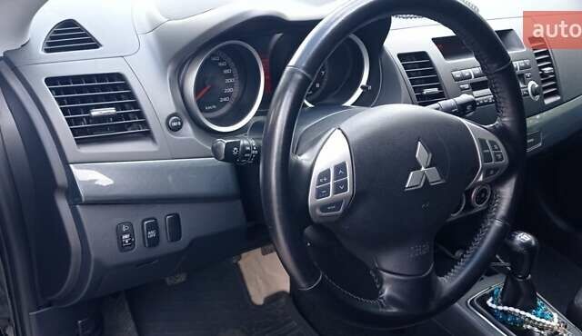 Чорний Міцубісі Lancer, об'ємом двигуна 2 л та пробігом 49 тис. км за 12500 $, фото 24 на Automoto.ua