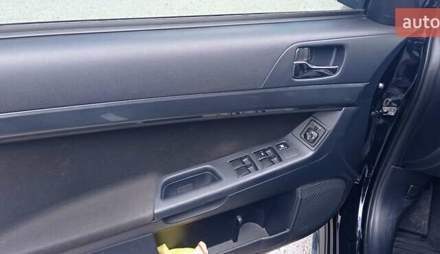 Чорний Міцубісі Lancer, об'ємом двигуна 2 л та пробігом 49 тис. км за 12500 $, фото 29 на Automoto.ua