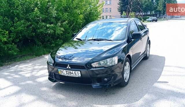 Чорний Міцубісі Lancer, об'ємом двигуна 2 л та пробігом 49 тис. км за 12500 $, фото 44 на Automoto.ua