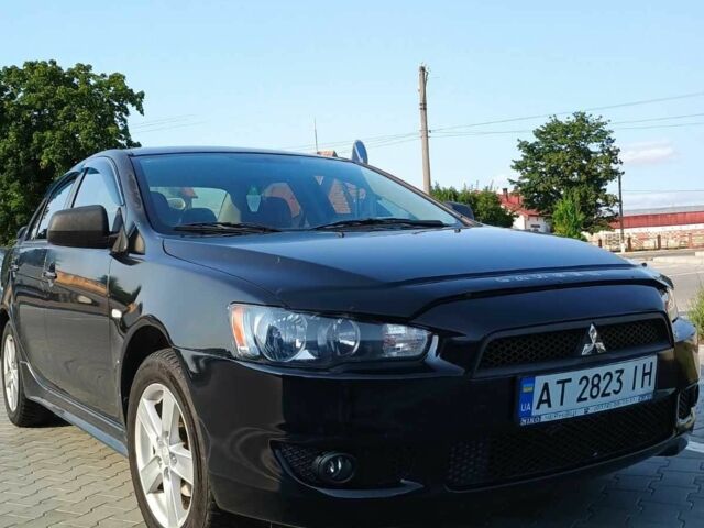 Чорний Міцубісі Lancer, об'ємом двигуна 2 л та пробігом 145 тис. км за 5200 $, фото 5 на Automoto.ua