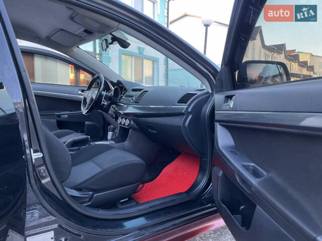 Чорний Міцубісі Lancer, об'ємом двигуна 1.8 л та пробігом 138 тис. км за 6777 $, фото 37 на Automoto.ua
