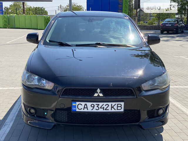 Чорний Міцубісі Lancer, об'ємом двигуна 2 л та пробігом 170 тис. км за 7000 $, фото 14 на Automoto.ua