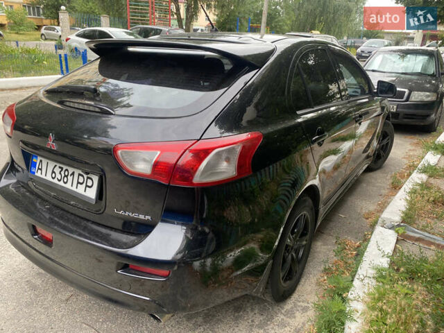 Чорний Міцубісі Lancer, об'ємом двигуна 1.8 л та пробігом 210 тис. км за 6499 $, фото 1 на Automoto.ua