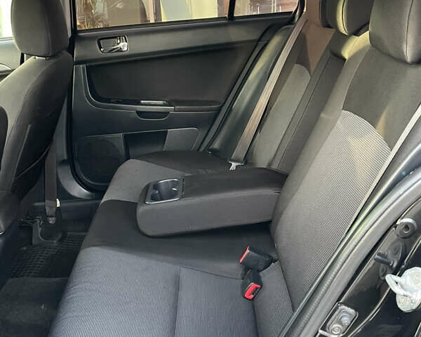 Чорний Міцубісі Lancer, об'ємом двигуна 1.8 л та пробігом 280 тис. км за 5900 $, фото 16 на Automoto.ua