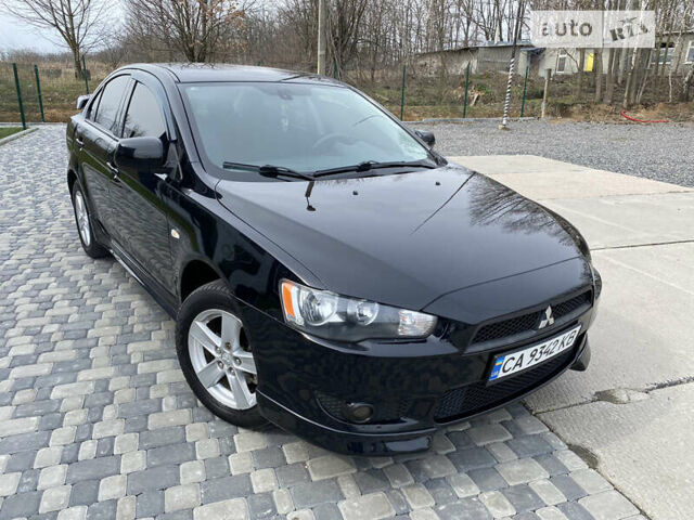 Чорний Міцубісі Lancer, об'ємом двигуна 2 л та пробігом 170 тис. км за 6999 $, фото 10 на Automoto.ua