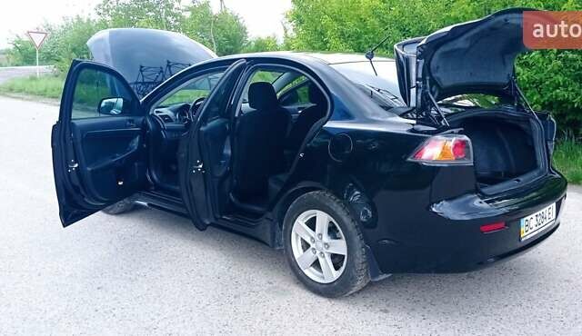 Чорний Міцубісі Lancer, об'ємом двигуна 2 л та пробігом 49 тис. км за 12500 $, фото 10 на Automoto.ua