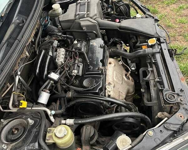 Чорний Міцубісі Lancer, об'ємом двигуна 1.6 л та пробігом 340 тис. км за 1776 $, фото 5 на Automoto.ua