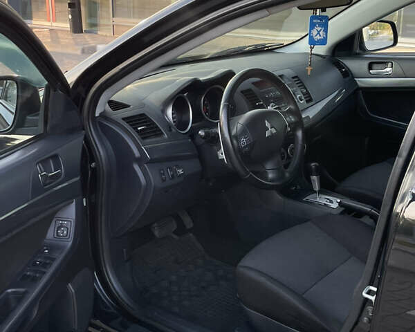 Чорний Міцубісі Lancer, об'ємом двигуна 1.8 л та пробігом 280 тис. км за 5900 $, фото 9 на Automoto.ua