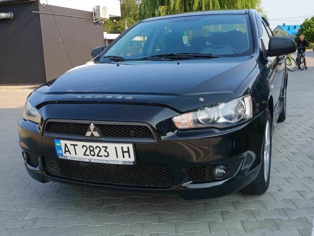 Чорний Міцубісі Lancer, об'ємом двигуна 2 л та пробігом 145 тис. км за 5200 $, фото 2 на Automoto.ua