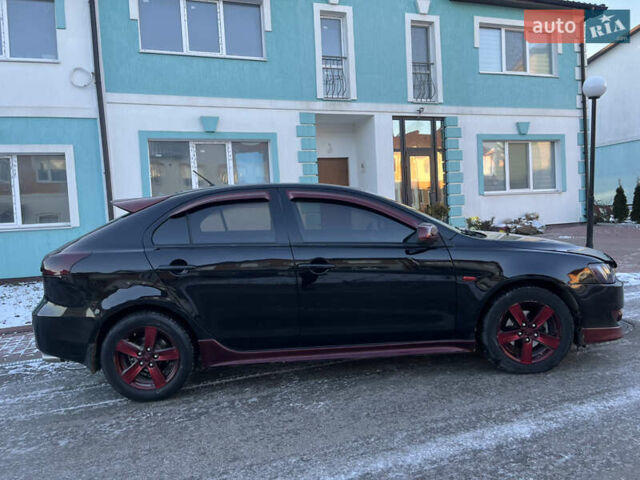Чорний Міцубісі Lancer, об'ємом двигуна 1.8 л та пробігом 138 тис. км за 6777 $, фото 21 на Automoto.ua