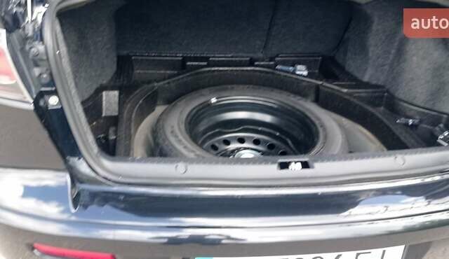 Чорний Міцубісі Lancer, об'ємом двигуна 2 л та пробігом 49 тис. км за 12500 $, фото 30 на Automoto.ua