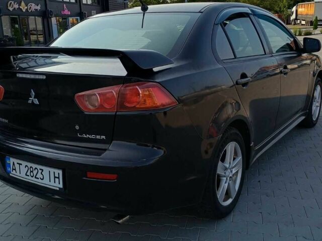 Чорний Міцубісі Lancer, об'ємом двигуна 2 л та пробігом 145 тис. км за 5200 $, фото 3 на Automoto.ua