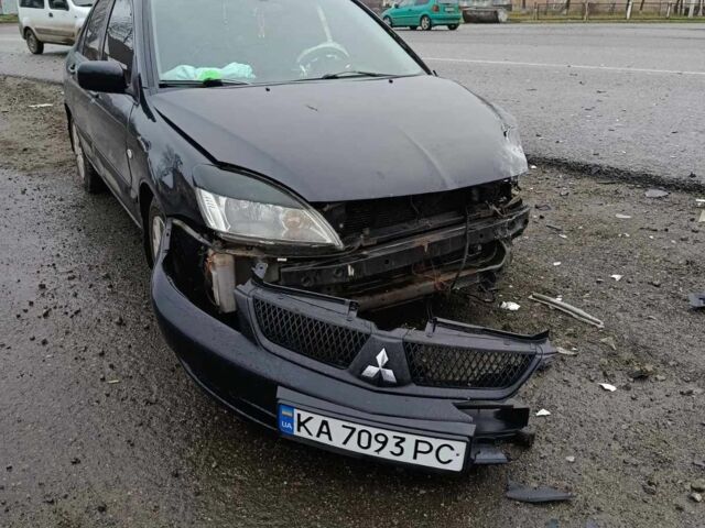 Чорний Міцубісі Lancer, об'ємом двигуна 1.6 л та пробігом 340 тис. км за 1776 $, фото 1 на Automoto.ua