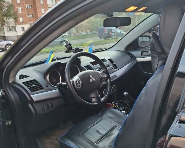 Чорний Міцубісі Lancer, об'ємом двигуна 2 л та пробігом 120 тис. км за 6950 $, фото 6 на Automoto.ua