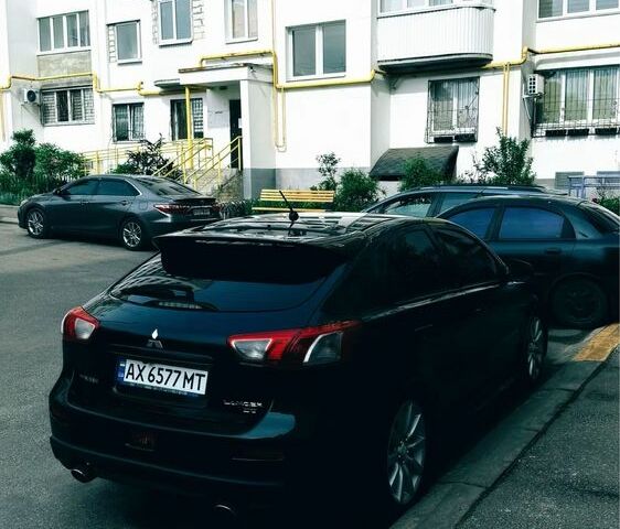 Черный Мицубиси Лансер, объемом двигателя 2 л и пробегом 190 тыс. км за 7100 $, фото 4 на Automoto.ua