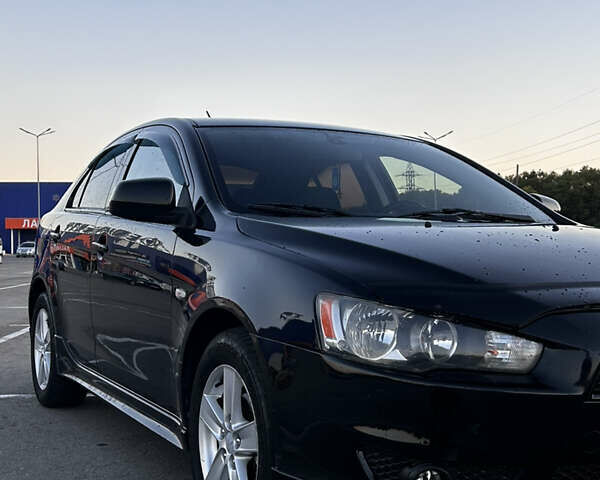 Чорний Міцубісі Lancer, об'ємом двигуна 1.8 л та пробігом 280 тис. км за 6800 $, фото 7 на Automoto.ua