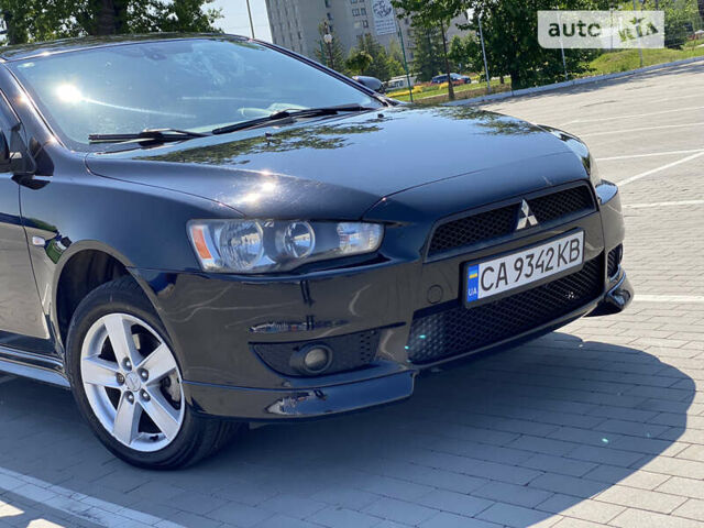 Чорний Міцубісі Lancer, об'ємом двигуна 2 л та пробігом 170 тис. км за 7000 $, фото 12 на Automoto.ua