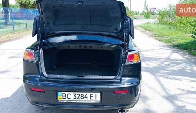 Чорний Міцубісі Lancer, об'ємом двигуна 2 л та пробігом 49 тис. км за 12500 $, фото 42 на Automoto.ua