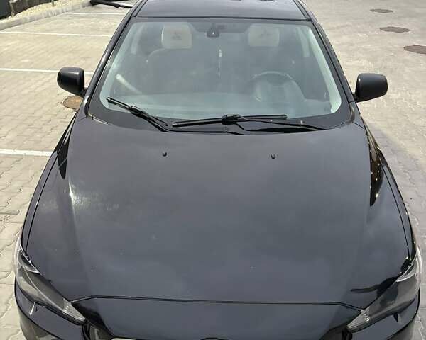 Чорний Міцубісі Lancer, об'ємом двигуна 1.8 л та пробігом 330 тис. км за 7000 $, фото 9 на Automoto.ua