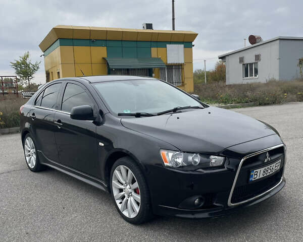 Черный Мицубиси Лансер, объемом двигателя 1.97 л и пробегом 300 тыс. км за 6800 $, фото 2 на Automoto.ua