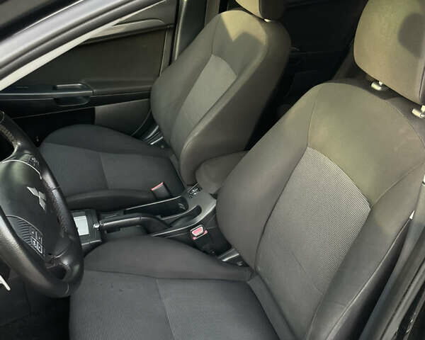 Чорний Міцубісі Lancer, об'ємом двигуна 1.8 л та пробігом 280 тис. км за 5900 $, фото 11 на Automoto.ua