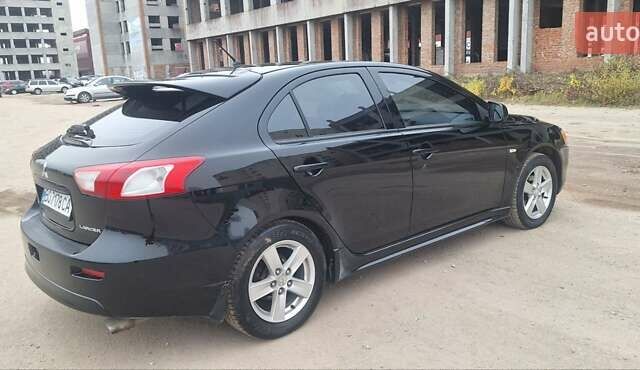 Чорний Міцубісі Lancer, об'ємом двигуна 1.8 л та пробігом 213 тис. км за 6200 $, фото 7 на Automoto.ua