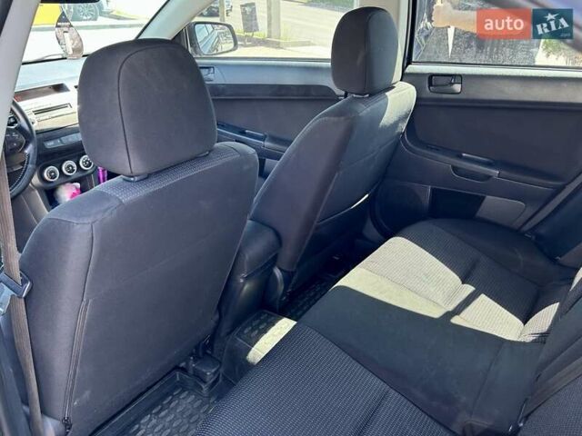 Чорний Міцубісі Lancer, об'ємом двигуна 1.8 л та пробігом 170 тис. км за 6700 $, фото 17 на Automoto.ua